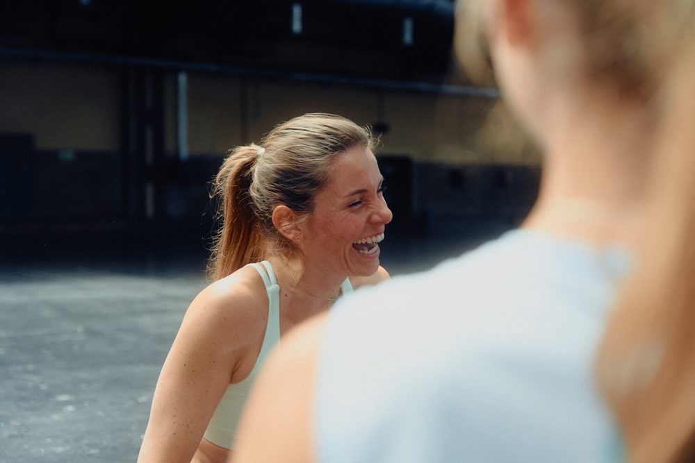 A member laughing mid-training
